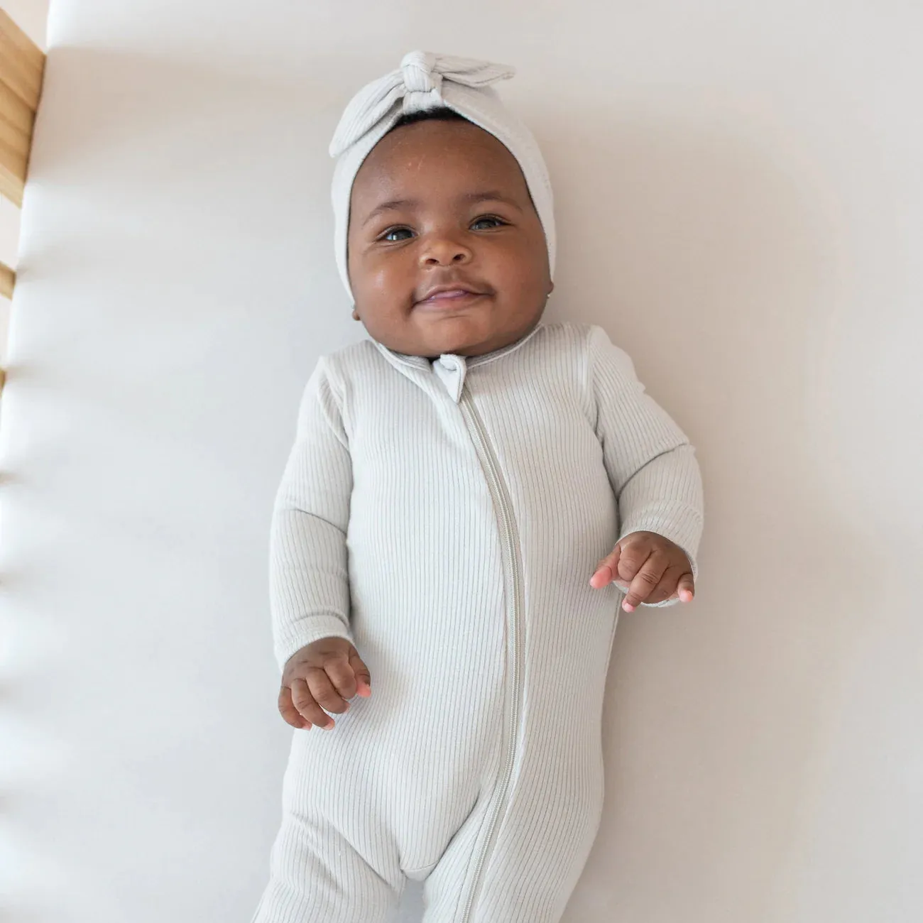 Kyte Baby - Ribbed Zipper Footie in Oat