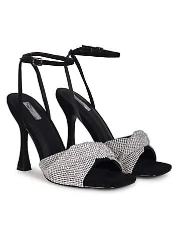 Lenora Black Faux Suede Heeled Sandals with Diamante Twisted Front Strap by Linzi | Look Again